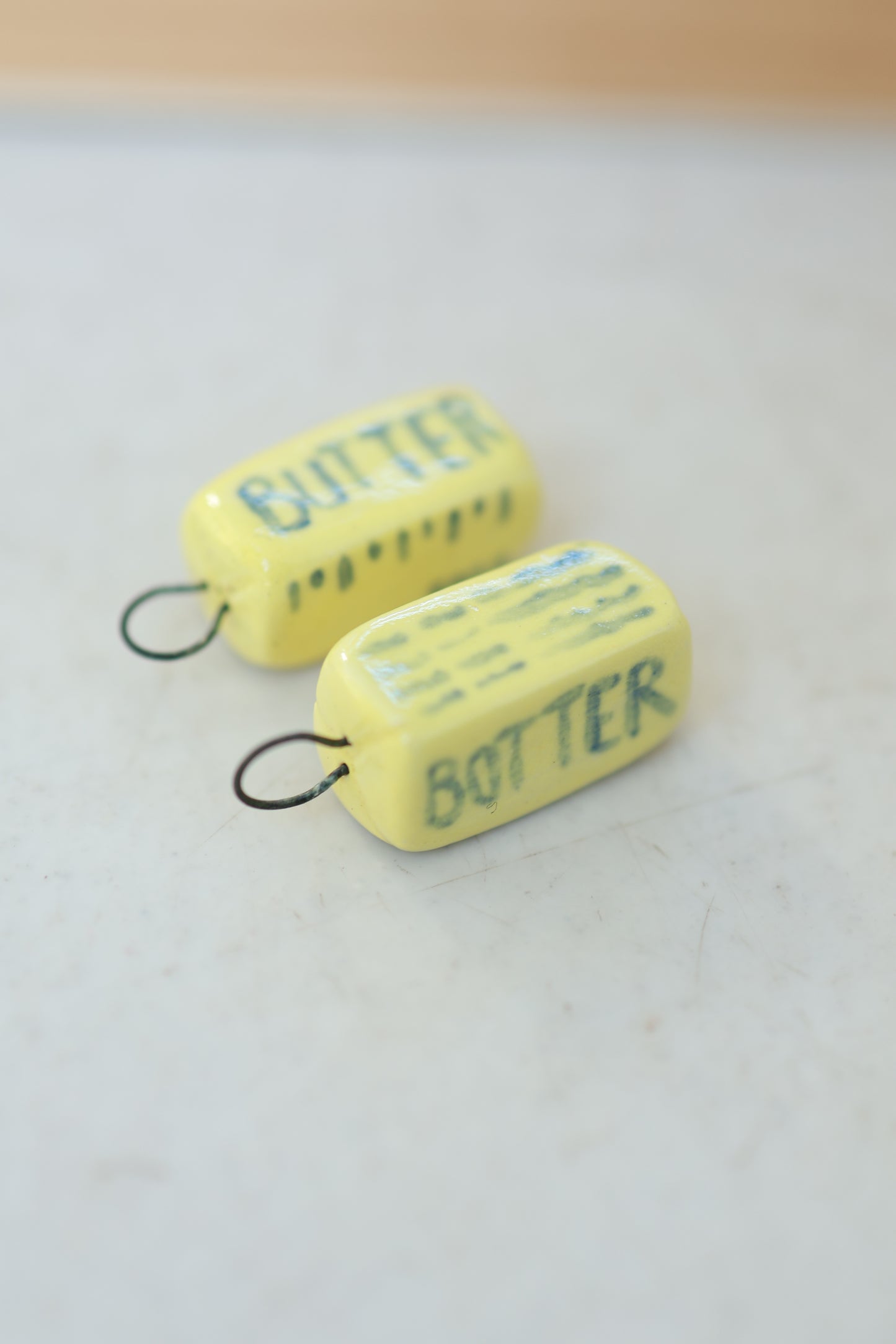 Butter/Botter Charm